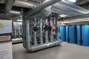 Der Aquiferspeicher am Bonner Bogen übernimmt bis zu 80 Prozent der Wärme- und Kälteversorgung von drei Gebäuden mit einer Gesamtfläche von 60.000 Quadratmetern. Foto: Paul Fleuchhaus, KIT Der Aquiferspeicher am Bonner Bogen übernimmt bis zu 80 Prozent der Wärme- und Kälteversorgung von drei Gebäuden mit einer Gesamtfläche von 60.000 Quadratmetern. Foto: Paul Fleuchhaus, KIT