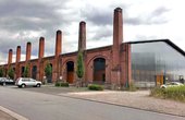 In der Hülle der ehemaligen Federnschmiede befindet sich heute ein architektonisch wie energetisch innovatives Bürogebäude. (Foto: GIU Gesellschaft für Innovation und Unternehmensförderung mbH)