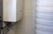 Wärmepumpe beheizt Einfamilienhaus Foto: Rotex