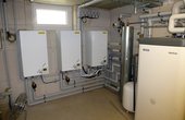 Die wandhängenden Innenteile von Rotex sind deutlich platzsparender als andere Wärmepumpen. (Foto: ROTEX)